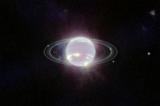 НАСА впервые сфотографировало колец Нептуна в инфракрасном диапазоне